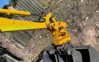 excavator tilting change